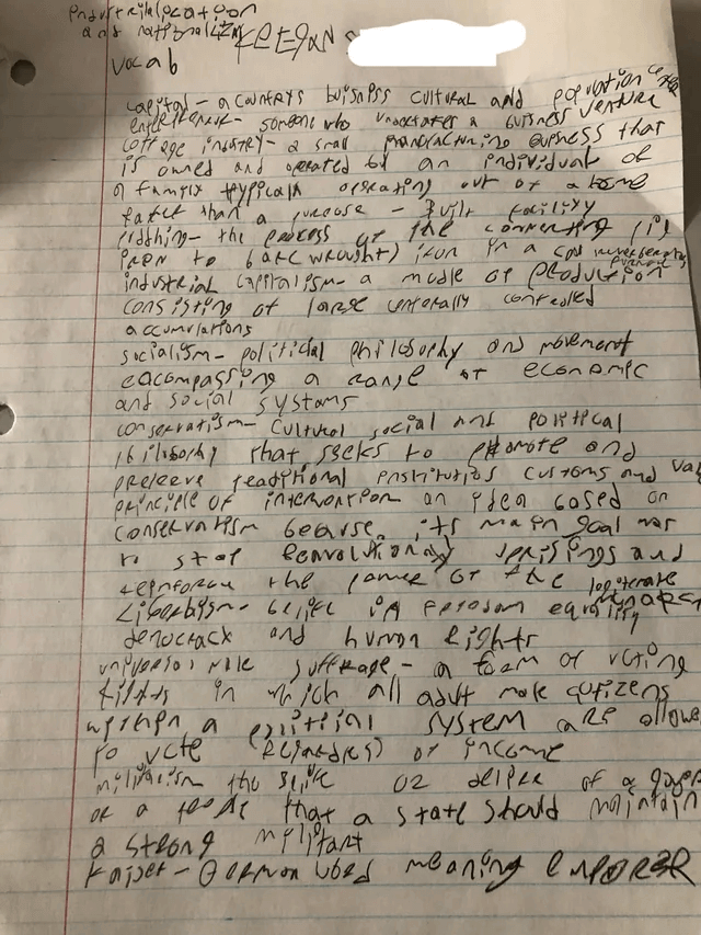 Students recording lectures in classroom